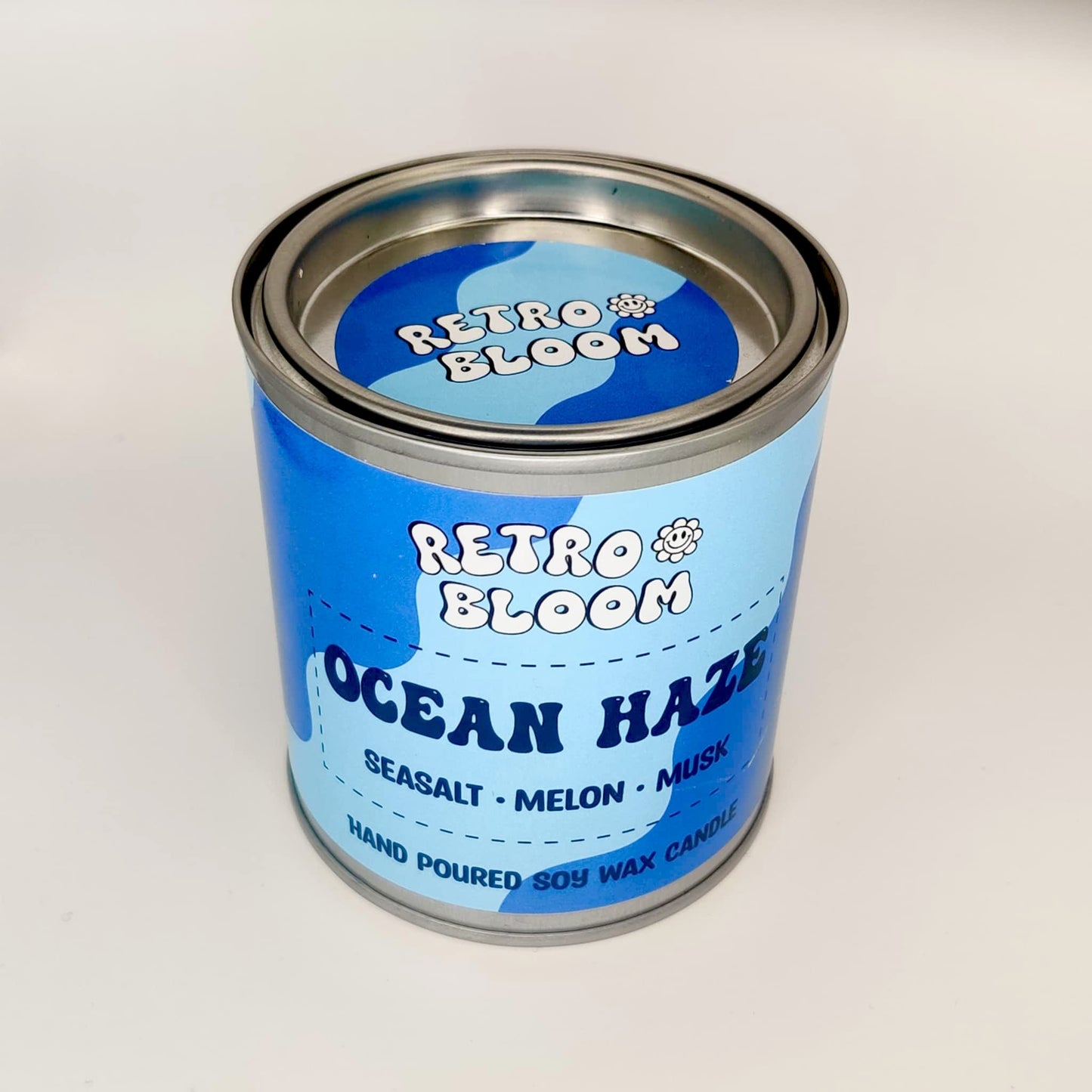 Ocean Haze candle in blue tin – fresh aquatic scented vegan soy wax candle by Retro Bloom