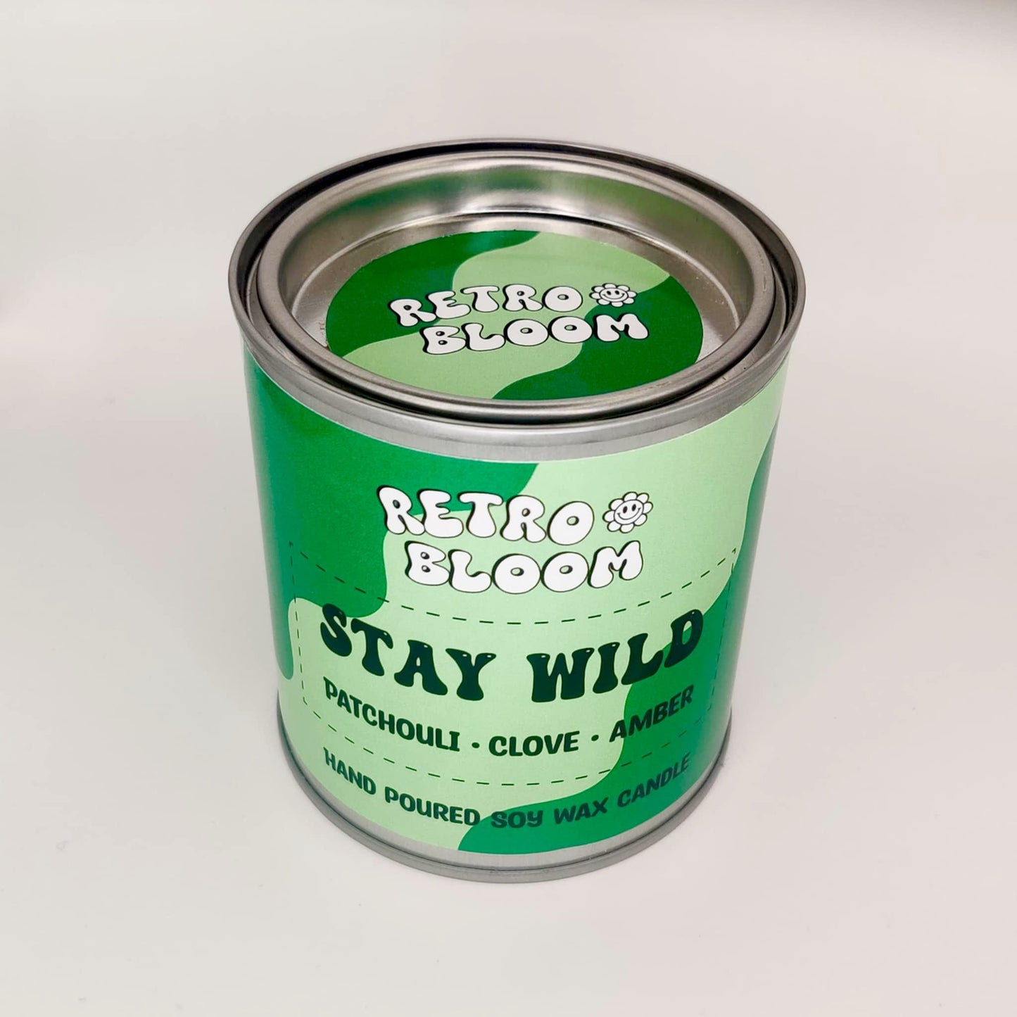 Stay Wild candle in bright tin – patchouli clove and amber vegan soy wax candle by Retro Bloom