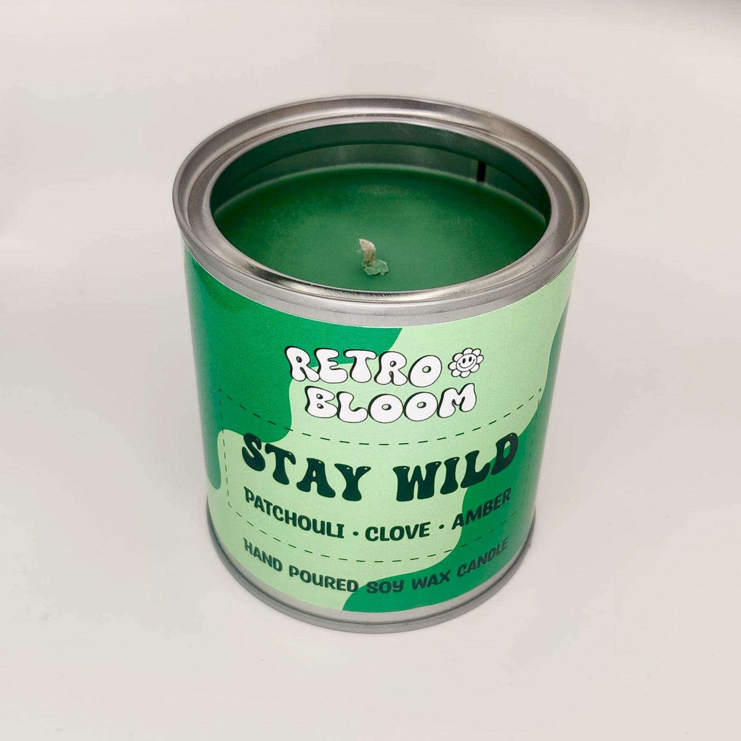 Stay Wild candle in bright tin – patchouli clove and amber vegan soy wax candle by Retro Bloom