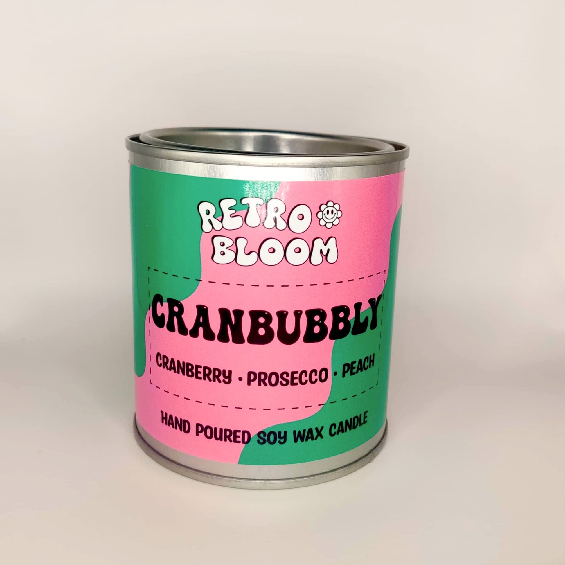 Cranbubbly candle in festive red tin – cranberry, prosecco, apple & musk soy wax candle by Retro Bloom