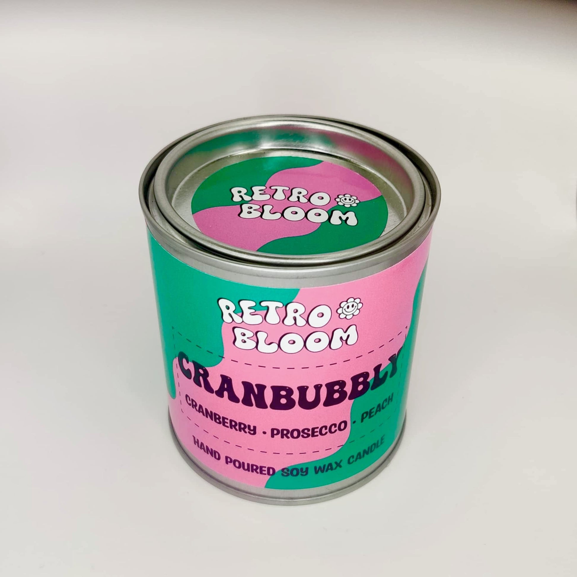 Cranbubbly candle in festive red tin – cranberry, prosecco, apple & musk soy wax candle by Retro Bloom