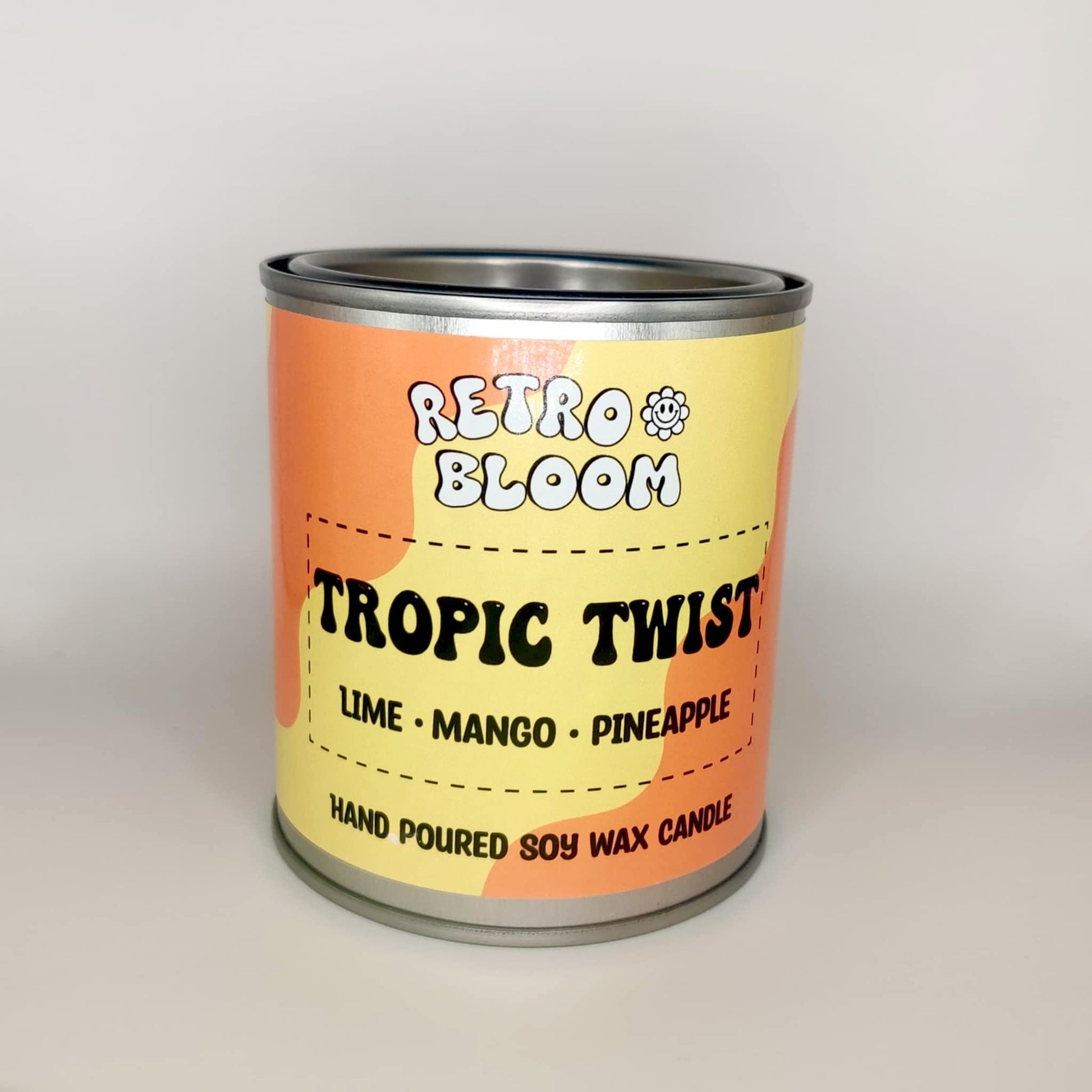 Retro Bloom Tropic Twist candle in bright tin – lime, mango, pineapple soy wax candle with zesty tropical scent